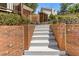 Brick and concrete stairway leads to an upper patio at 828 Jami Ct, Lawrenceville, GA 30046