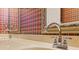 Bathroom vanity with double sinks and chrome faucets at 828 Jami Ct, Lawrenceville, GA 30046