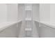 Well-organized walk-in closet with shelving units for optimal storage solutions at 828 Jami Ct, Lawrenceville, GA 30046