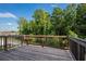 Wooden deck overlooking wooded backyard at 953 Mystic Way, Hampton, GA 30228
