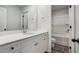 Bathroom featuring white vanity with solid surface countertop and tub shower at 953 Mystic Way, Hampton, GA 30228