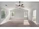 Bright bedroom with lots of natural light from the windows and a ceiling fan at 953 Mystic Way, Hampton, GA 30228