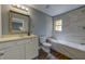 Modern bathroom with separate tub and tiled shower, vanity with sink and toilet at 103 Chicamauga Sw Ave, Atlanta, GA 30314