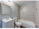 Bathroom with tub and shower combination and vanity with sink at 103 Chicamauga Sw Ave, Atlanta, GA 30314