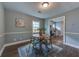 Cozy dining room featuring a round table, modern chairs, and stylish decor at 103 Chicamauga Sw Ave, Atlanta, GA 30314