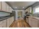 Well-lit kitchen with stainless appliances and easy access to the dining area at 103 Chicamauga Sw Ave, Atlanta, GA 30314