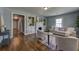 Bright living room showcasing hardwood floors, built-in shelving, and a decorative fireplace at 103 Chicamauga Sw Ave, Atlanta, GA 30314