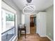 Dining area with a window and modern lighting fixture at 1192 Sandalwood Dr, Lawrenceville, GA 30043