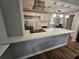 Modern kitchen featuring quartz countertops, stainless steel appliances, and stylish pendant lighting at 1192 Sandalwood Dr, Lawrenceville, GA 30043