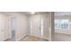 Inviting foyer with tile flooring and natural light at 150 Mills Creek Ln, Covington, GA 30016