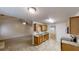 Open concept kitchen featuring tile flooring, granite countertops, and stainless appliances at 150 Mills Creek Ln, Covington, GA 30016
