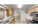 Spacious kitchen with granite counters, stainless appliances, and ample cabinetry at 150 Mills Creek Ln, Covington, GA 30016