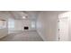 Bright living room features vaulted ceilings, fireplace, and neutral decor at 150 Mills Creek Ln, Covington, GA 30016
