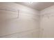 Spacious walk-in closet with multiple shelves for optimal storage at 150 Mills Creek Ln, Covington, GA 30016
