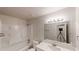 Clean bathroom with tub-shower, white vanity, offering a functional and stylish space at 2530 Flippen Rd, Stockbridge, GA 30281