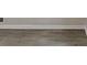 Wood look flooring runs throughout the home, seen here at 2530 Flippen Rd, Stockbridge, GA 30281