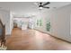 Light-filled room, hardwood floors, access to outside and leads into a modern kitchen at 2732 Eagles Crest Ln, Decatur, GA 30034
