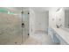 Main bath featuring a glass shower enclosure and quartz countertops at 2732 Eagles Crest Ln, Decatur, GA 30034