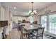 Spacious kitchen features stainless appliances, a center island and an adjacent eating area at 3783 Wickford Ln, Peachtree Corners, GA 30096