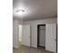 Bright bedroom featuring a closet, neutral walls, and soft carpet at 765 Stonebridge Run, Lithonia, GA 30058