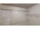 Walk in closet featuring multiple wire rack shelves for ample storage at 765 Stonebridge Run, Lithonia, GA 30058