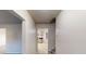 Bright entryway featuring neutral walls and a glimpse of the kitchen with tile floors at 765 Stonebridge Run, Lithonia, GA 30058