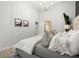 Comfortable bedroom featuring a plush bed, soft lighting, and a peaceful ambiance at 980 Pine Grove Rd, Roswell, GA 30075