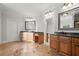 Spacious primary bathroom with dual vanities and plenty of counter space and cabinet storage at 980 Pine Grove Rd, Roswell, GA 30075
