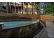 Beautiful pool with stone features and a waterfall element in a private backyard at 980 Pine Grove Rd, Roswell, GA 30075