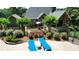 Secluded backyard oasis with lounge chairs, well-maintained landscaping, and a privacy fence, creating the perfect retreat at 102 Cavit Ct, Canton, GA 30114