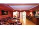 Finished basement featuring a lounge area with a wet bar and access to the exercise room at 102 Cavit Ct, Canton, GA 30114