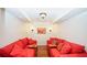 Finished basement featuring two red couches with small tables and recessed lighting at 102 Cavit Ct, Canton, GA 30114