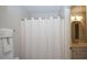 Bathroom featuring a shower-tub combination and white cabinets at 102 Cavit Ct, Canton, GA 30114