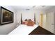 Bedroom with a four-poster bed, ensuite bathroom, and light paint at 102 Cavit Ct, Canton, GA 30114