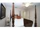 Neutral bedroom with a four-poster bed, ceiling fan, and white trim at 102 Cavit Ct, Canton, GA 30114