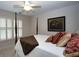Comfortable bedroom featuring a four-poster bed, plantation shutters, and tasteful decor, creating a relaxing ambiance at 102 Cavit Ct, Canton, GA 30114