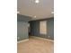 Spacious room with carpeted floor, neutral paint, and abundant natural light from the shuttered window at 102 Cavit Ct, Canton, GA 30114