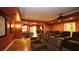 Finished basement home theater and entertainment area with custom seating and wet bar at 102 Cavit Ct, Canton, GA 30114