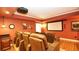 Home theater with projector, screen, and leather reclining chairs for ultimate entertainment at 102 Cavit Ct, Canton, GA 30114