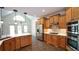 Well-equipped kitchen with stainless steel appliances, and ample cabinet space at 102 Cavit Ct, Canton, GA 30114