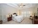 Bedroom with plush carpet, tray ceilings, and plantation shutters at 102 Cavit Ct, Canton, GA 30114