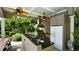 Outdoor kitchen with granite counters, built-in grill, and refrigerator for outdoor entertaining at 102 Cavit Ct, Canton, GA 30114