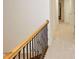 Upstairs carpeted hallway with staircase at 102 Cavit Ct, Canton, GA 30114