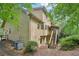 Spacious backyard with deck access, offering a serene outdoor living space at 10660 Dunoon Dr, Alpharetta, GA 30022
