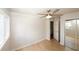 Spacious bedroom with ceiling fan, hardwood floors, and closet at 1199 Ashborough Se Dr # K, Marietta, GA 30067