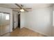 Bright bedroom featuring hardwood floors, mirrored closet and ceiling fan at 1199 Ashborough Se Dr # K, Marietta, GA 30067