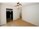 Open floor plan showing dining area with hardwood floors connected to kitchen at 1199 Ashborough Se Dr # K, Marietta, GA 30067