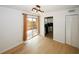 Dining room with wood floors and sliding door, adjacent to the kitchen at 1199 Ashborough Se Dr # K, Marietta, GA 30067