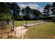 Fenced yard with lush green grass, providing privacy and safety for outdoor activities and peace of mind at 1199 Ashborough Se Dr # K, Marietta, GA 30067