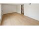 Spacious living room with wooden floors and a staircase offering bright, natural light at 1199 Ashborough Se Dr # K, Marietta, GA 30067